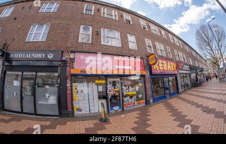 Morden, Surrey, UK. 12 April 2021. Small ‘non-essential’ local shops in the outer London Borough of Merton reopen alongside food outlets as Covid-19 lockdown easing begins. Image: local barbers and hair salons opened for custom. Credit: Malcolm Park/Alamy Live News Stock Photo