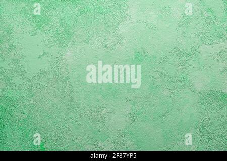 green concrete wall, plaster. Light green blank background. Stock Photo