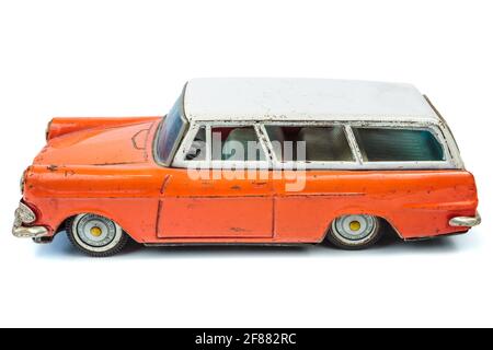 Classic miniature orange and white family combi car isolated on a white background Stock Photo