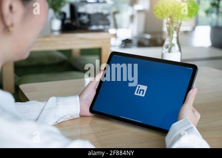 CHIANG MAI, THAILAND : JULY 26, 2020 : LinkedIn logo on ipad screen. LinkedIn is a social network for search and establishment of business contacts Stock Photo