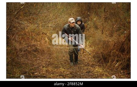 Wild Boar hunting at 'CHASSE DE LA LOIRE' in France....Chef Director of Caprice Holdings Ltd. Mark Hix  on a hunting trip to Chasse de la Loire, Host Niels Bryan-Low guides Mark through the forest in search of  wild Boar.pic David Sandison 2/3/2003 Stock Photo