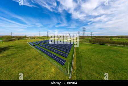 Solar panels and energy power plant in aerial view. 100 percent green energy Stock Photo