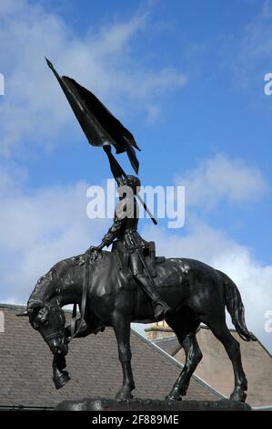 Bronze statue of charger ridden by youth holding standard, Hawick, Scottish Borders, Scotland.  Marks the victory in 1514 of local youths over large f Stock Photo