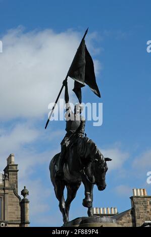 Bronze statue of charger ridden by youth holding standard, Hawick, Scottish Borders, Scotland.  Marks victory in 1514 of local youths over large force Stock Photo