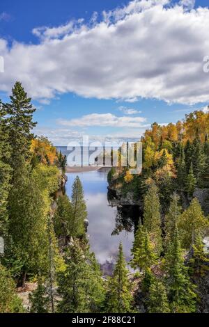 Clouds reflecting on Baptism River in Autumn at Tettegouche State Park, Minnesota Stock Photo