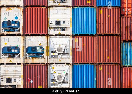 Refrigerated Container Stack Stacked freight shipping containers and refrigerators. Refrigerated ...