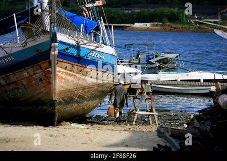 salvador, bahia / brazil - january 5, 2017: boats are seen anchored at the pier in the Ribeira neighborhood in the city of Salvador. *** Local Caption Stock Photo