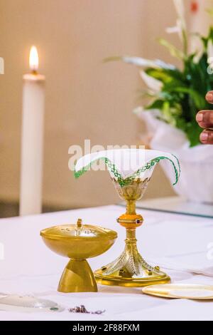 bread becomes the body of Christ in the hands of the pope, holy father Stock Photo