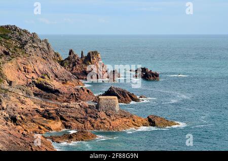 Great Britain, Jersey Island, cliffs and plants on Corbiere Bay Stock Photo  - Alamy