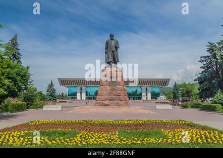 ALMATY, KAZAKHSTAN - JUNE 1, 2017: Abai Qunanbaiuly Abay Kunanbayev monument in Almaty, Kazakhstan. Republic Palace in the background. Stock Photo