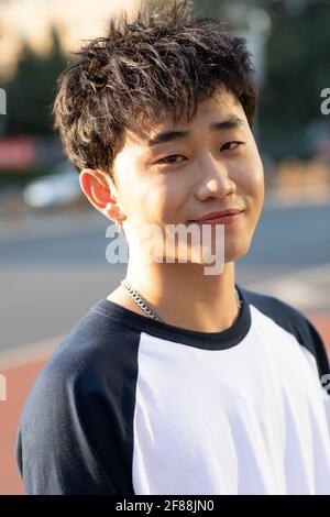 Fashionable young man on street Stock Photo