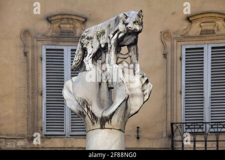 Statue of Romulus and Remus being suckled by the she-wolf in Siena, Siena Province, Tuscany, Italy. Stock Photo