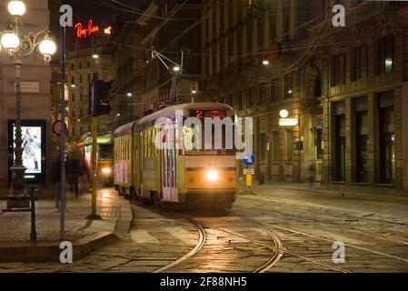 MILAN, ITALY - SEPTEMBER 28, 2017: Tram on the night street Stock Photo