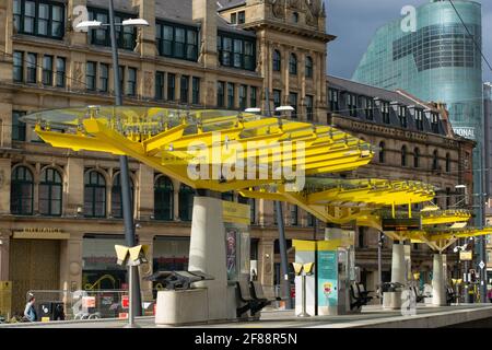 Exchange Square Metrolink tram stop with no people during national lockdown in England. National Museum of Football in background. Stock Photo