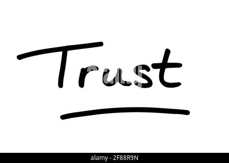 Trust, handwritten on a white background. Stock Photo