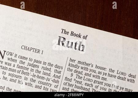 This is the King James Bible translated in 1611.  There is no copyright.  A razor-sharp macro photograph of the first page of the book of Ruth. Stock Photo