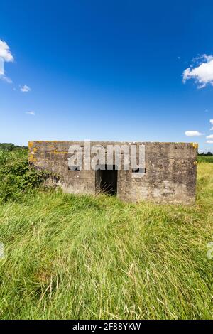 Type 24 WWII Pillbox,, on sunny summer day by River Perret, Bridgewater, Somerset, United Kingdom, portrait, wide angle. Stock Photo
