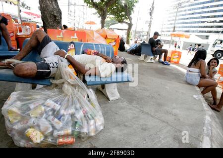 salvador, bahia / brazil - february 24, 2017: people are seen sleeping on the street near Farol da Barra after the carnival party in the city of Salva Stock Photo