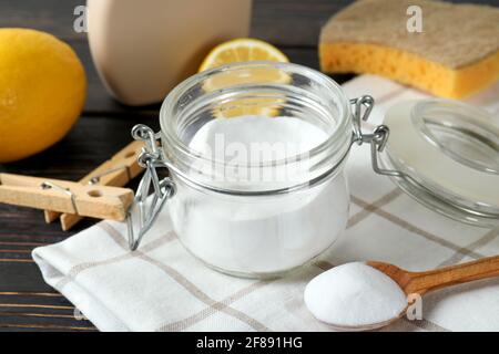 Eco friendly cleaning tools on wooden background Stock Photo