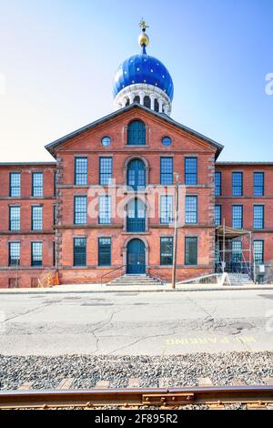 Colt Firearms Factory, on Van Dyke Avenue, with its distinctive gold star-spangled blue onion dome. Stock Photo