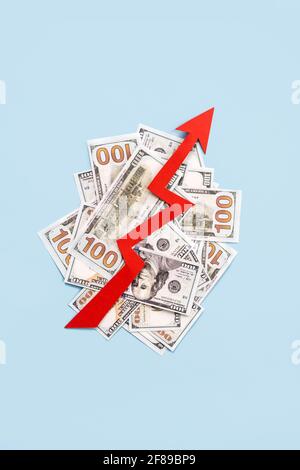 Global economy recovery, Business Economic growth. Financial, industrial and market sector comeback and upturn concept. Paper red arrow graph on 100 Stock Photo