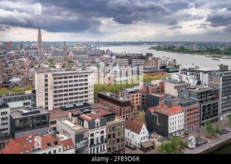 Antwerp, Belgium - 04.29.2018: View of the city from above on a cloudy, rainy day. Dramatic clouds on the horizon. River Scheldt, Cathedral of Our Lad Stock Photo