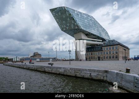 Antwerp, Belgium - 04.29.2018: Modern building of Port Authority Building on a cloudy, rainy day. Famous architecture of Belgium. Stock Photo