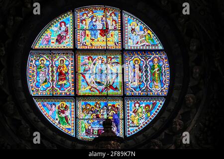 Siena, Italy.  Stained glass window by DUCCIO di Buoninsegna in the Cathedral of Santa Maria Assunta.  (For Editorial Use Only) Stock Photo