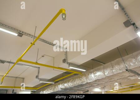 The fire suppression system in the building. Pipe with sprinkler Stock Photo