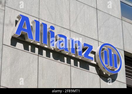 Lugano, Switzerland - 30th March 2021 : Allianz company sign hanging on building in Lugano. Allianz is a German multinational financial services compa Stock Photo
