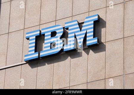 Lugano, Ticino, Switzerland - 1st April 2021 : IBM (International Business Machines Corporation) sign hanging on a building in Lugano. IBM is an Ameri Stock Photo
