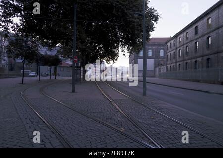 Porto in the morning seeing the old Alfandega, Miragaia neighborhood and the tram tracks Stock Photo