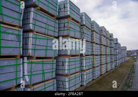 New stacks of granite stones on palletts Stock Photo