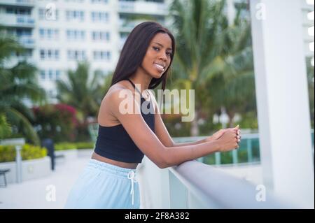 Portrait of a Young African American Woman Casually standing outside Stock Photo