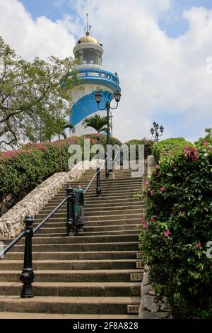 Blue and White Lighthouse or El Faro on Santa Ana Hill in Guayaquil, Ecuador, South America with Blue Sky and Steep Stairs Stock Photo