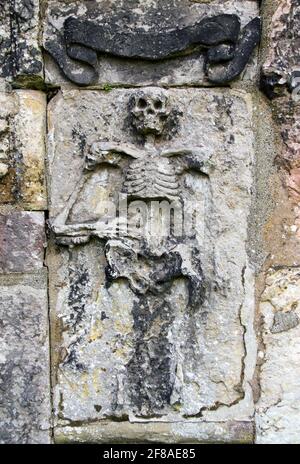Stone Skeleton Carving in Cemetery in Edinburgh Scotland Stock Photo