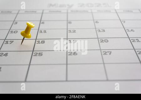 Calendar with pushpin in May 17 2021 to illustrate the new extended date for IRS Federal Income Tax Returns. USA Tax deadline concept Stock Photo