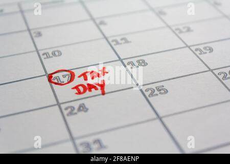 US tax day marked on calendar in May 17 2021 to illustrate the new extended date for IRS Federal Income Tax Returns. USA Tax deadline concept Stock Photo