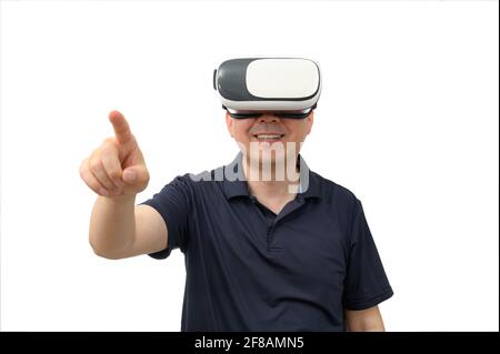 Man wearing virtual reality goggles. Studio shot, white background. Stock Photo