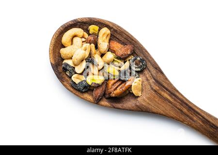 Mix of salted nuts in wooden spoon isolated on white background. Stock Photo