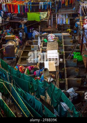 MUMBAI, INDIA - December 29, 2021:Dhobi Ghat is a well known open air laundromat in Mumbai. Laundry hanging in the open to dry. Stock Photo