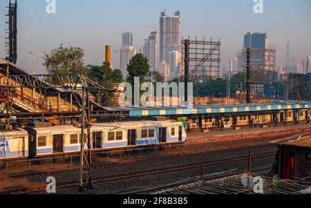 MUMBAI, INDIA - December 29, 2021: Mumbai local train transportation, one of the busiest commuter rail systems in the world hit by covide 19 pandemic Stock Photo