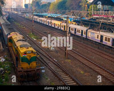 MUMBAI, INDIA - December 29, 2021: Mumbai local train transportation, one of the busiest commuter rail systems in the world hit by covide 19 pandemic Stock Photo