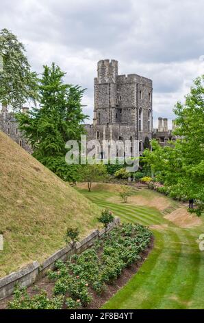 The royal residence of Windsor Castle, Berkshire, UK; the view across the Moat Garden to the buildings on the Lower Ward. Stock Photo