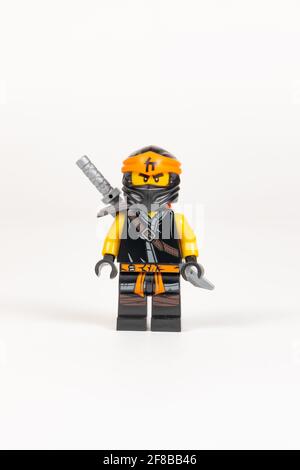 Yekaterinburg. Russia, 08/04/2021. Hero toy Cole with a sword from a set of lego ninjago on a white background. close-up Stock Photo