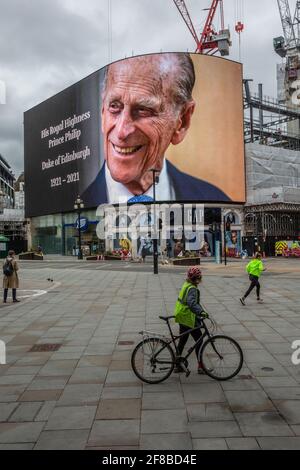 World-famous Piccadilly Circus advertising billboard in central London displayed a tribute to Prince Philip after he died on April 9th 2021 aged 99. Stock Photo