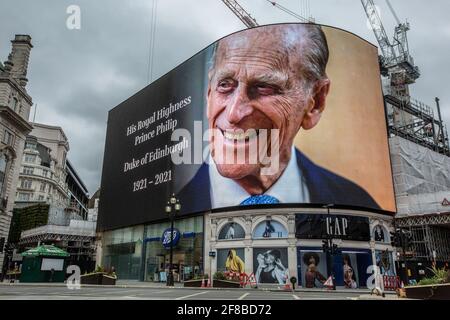 World-famous Piccadilly Circus advertising billboard in central London displayed a tribute to Prince Philip after he died on April 9th 2021 aged 99. Stock Photo