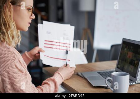 Female teacher conducts online lessons Stock Photo