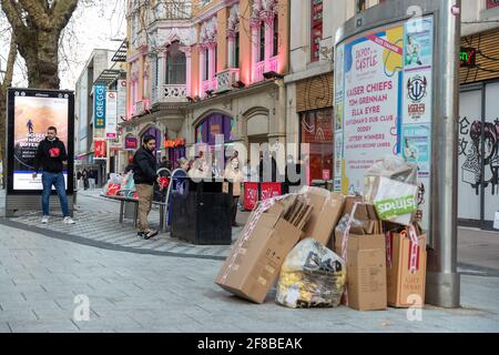 Cardiff, Wales, UK - April 12th 2021: General View of Queen Street, as shoppers descend on Cardiff City centre, this evening. Stock Photo