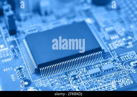 Closeup of chip. Electronic circuit board with chip. Macro with extremely shallow dof. Family of microchip. Generation of microchip. Stock Photo